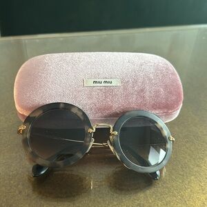 Miu Miu Delice round tortoise shell color brown sunglasses
